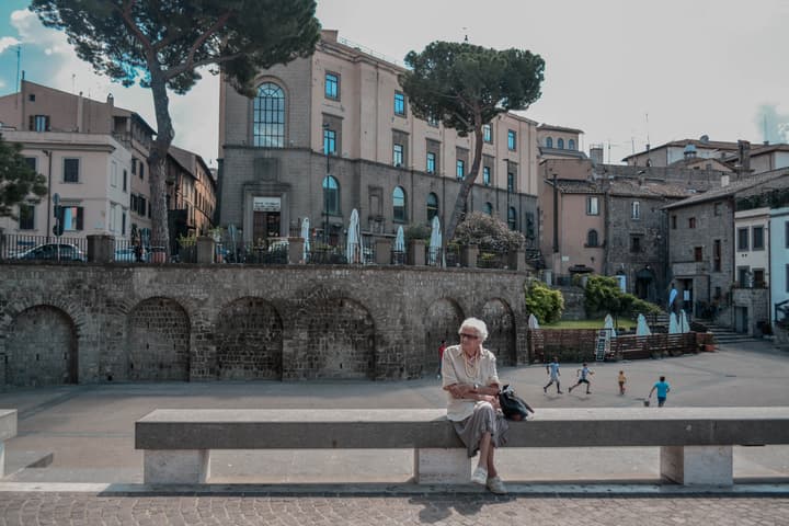 Italian mama sitting in Viterbo, 2019